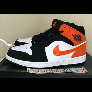Orange and black Jordan 1s